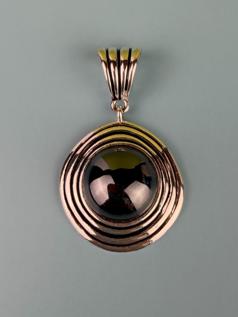 Premier Designs Silver Tone Concentric Orbit Pendant with Hematite Cabochon